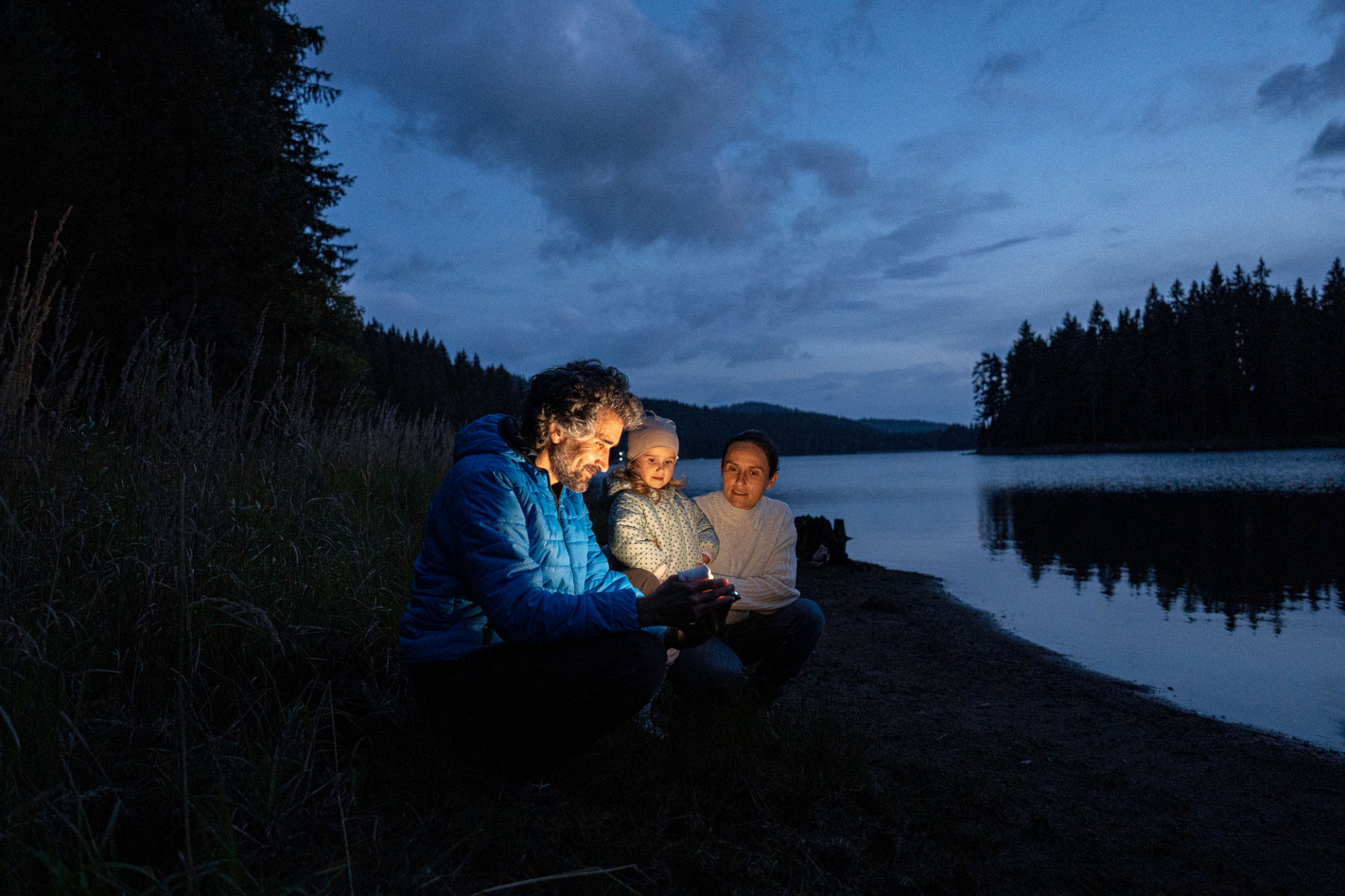 family camping outdoors